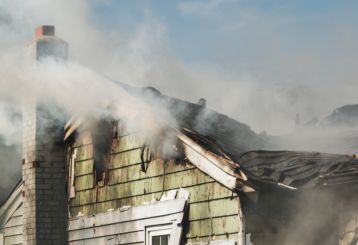 Experts cleaning smoke and fire residue from an Inglewood home.