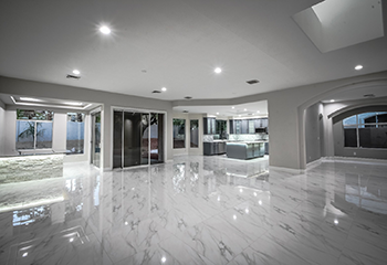 First-floor remodel with polished marble tiles and a modern kitchen in Hawthorne.